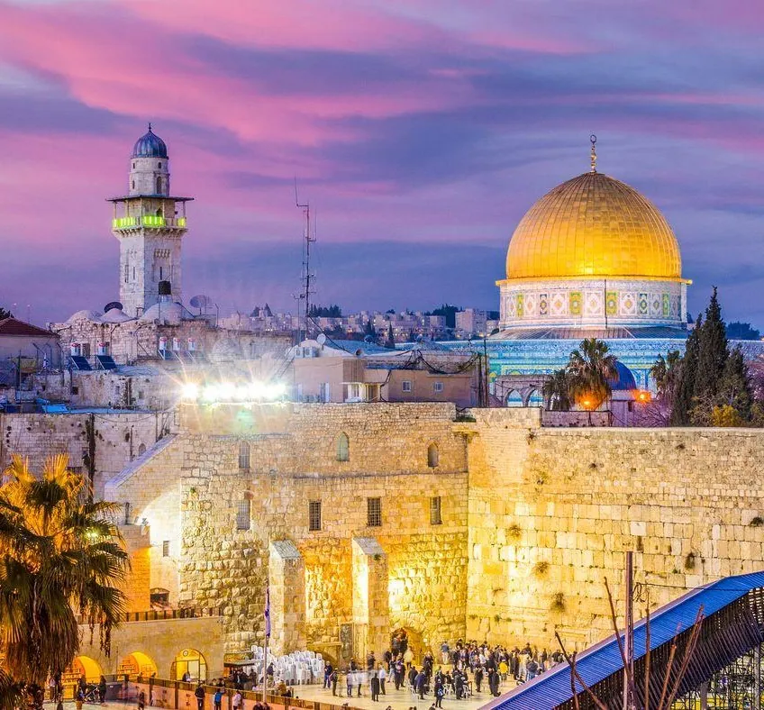 The Western Wall and the Dome of the Rock in Jerusalem’s Old City at dusk